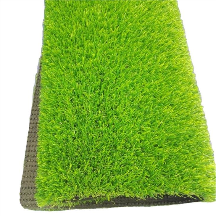 putting down artificial grass